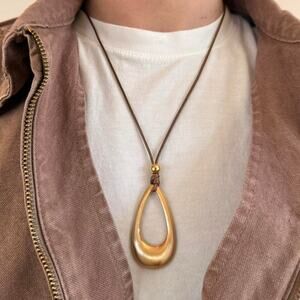 Y2k 2000s gold pendant and